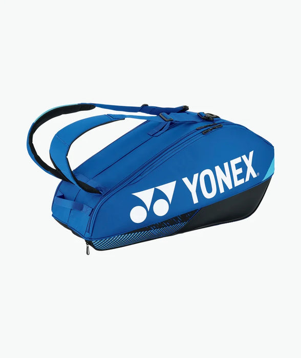 Yonex Pro Racquet Bag 6 Cobalt Blue side view with white Yonex logo and backpack carrying straps