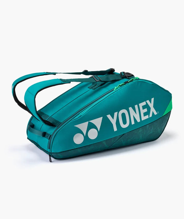 Yonex Pro Racquet Bag 6 BA92426 Teal Green angled side view with white Yonex logo, green accents and backpack straps