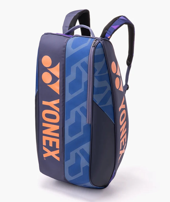 Yonex Pro Racquet Bag 6 Midnight Navy upright front view with blue panels and orange Yonex logo