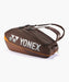 Yonex Pro Racquet Bag 6 Espresso Brown side view with silver Yonex logo and orange trim