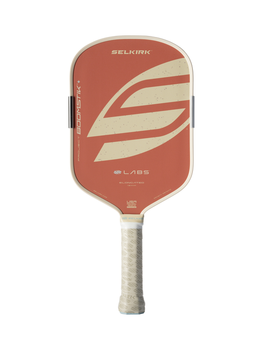 Selkirk LABS Boomstik Elongated Canyon Clay paddle, front view with cream graphics and grip