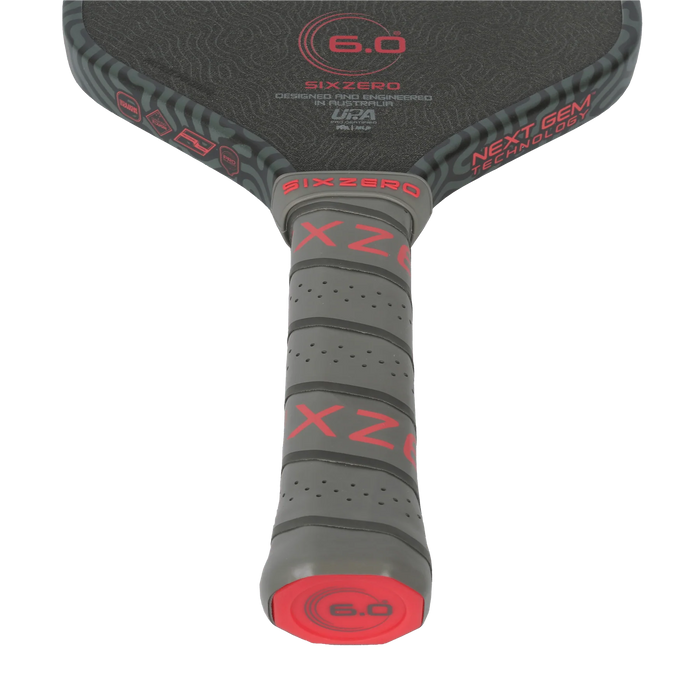 Six Zero Coral Pro Hybrid 16mm pickleball paddle in Infrared, handle and throat detail