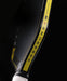 Close-up of the Pressure X 8E yellow side edge and branding near the paddle throat