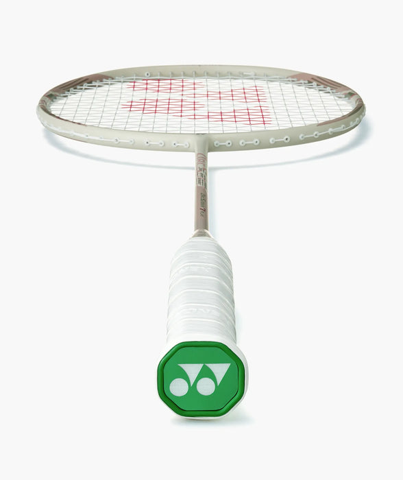 Yonex ARCSABER 7 PLAY Light Beige badminton racket frame, grip and green end cap detail