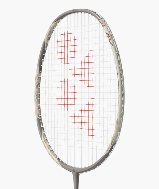 Yonex ASTROX 77 PLAY Light Beige badminton racket head angled view