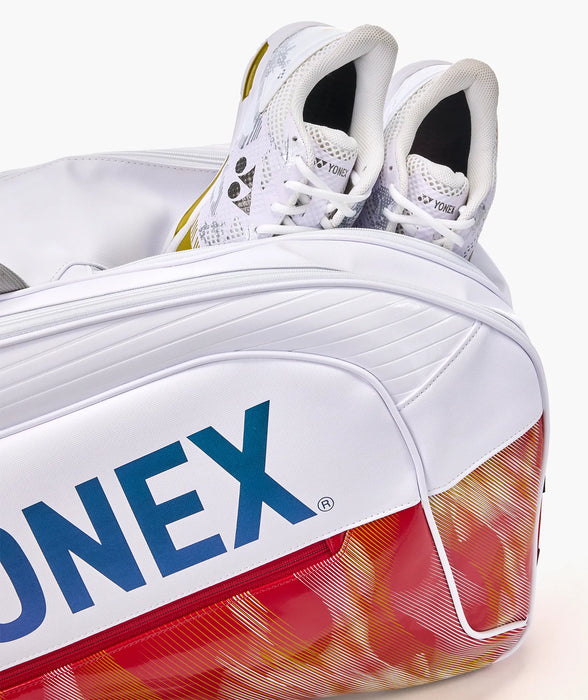 Yonex Expert Racquet Bag 6 PCS in white/red showing dedicated compartment for badminton shoes