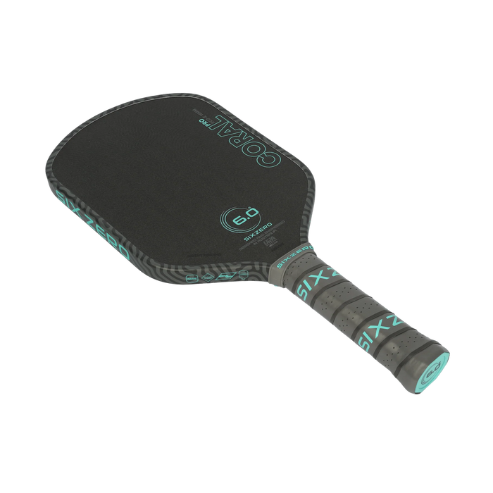 Six Zero Coral Pro Elongated 16mm pickleball paddle in Electric Blue, diagonal face and grip view