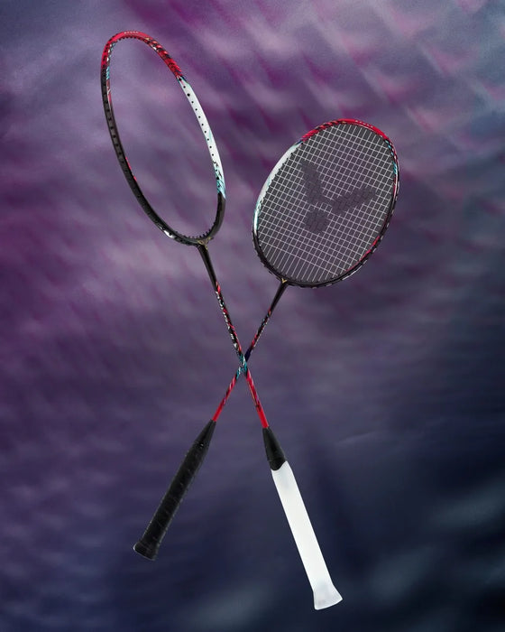 VICTOR Thruster Ryuga III CQ rackets on a purple background