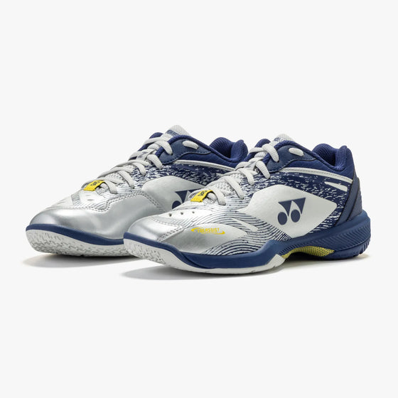 Yonex Power Cushion 65 Z VA women's badminton shoes in Silver/Navy, front three-quarter view of pair