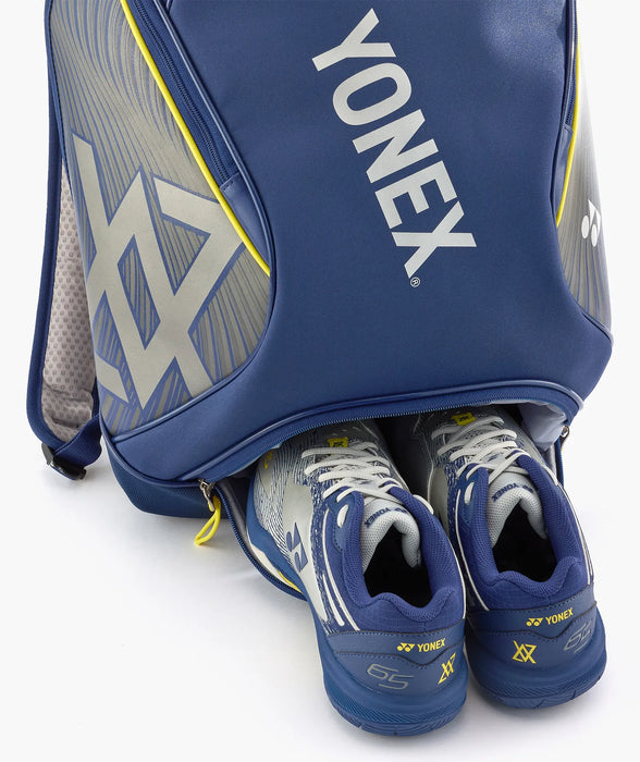 Bottom shoe compartment on Yonex BA02612V backpack, shown with shoes